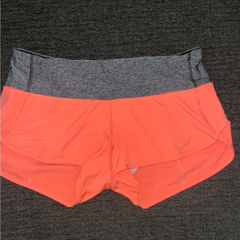 Coral with grey waist band.